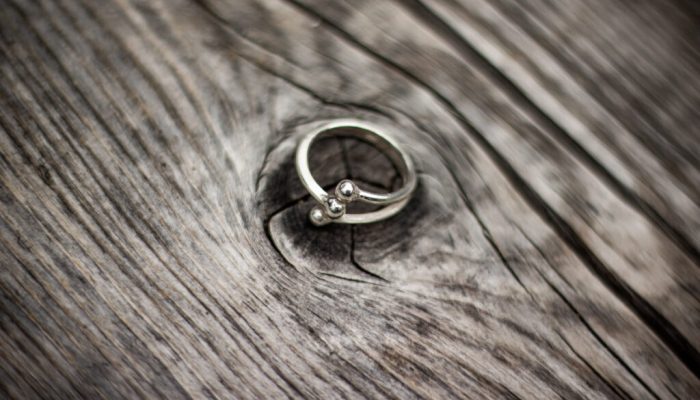 Jewelry ring with wood. Ring for weeding. wooden texture